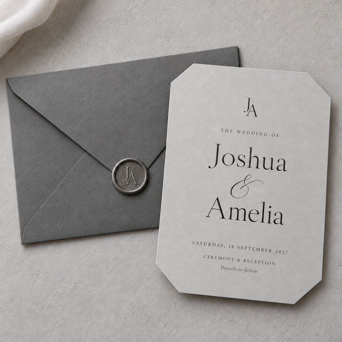 Grey clipped-corner digital wedding invitation design beside a matching envelope and monogram seal.